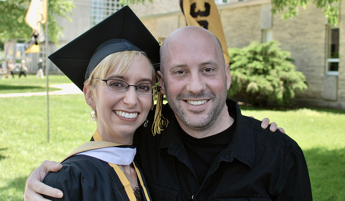 Gayla Guthrie with her brother Patrick Guthrie at her graduation.